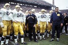 the football players are lined up on the field for their team's national game