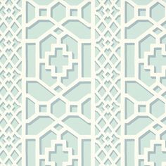 a blue and white wallpaper with an intricate design on the back side of it