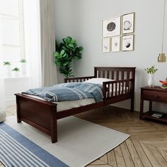 Plenty of room for sleep and play? Now that’s a win-win! The Max & Lily Twin Bed with SIngle Guardrail is the perfect combination of functional and fun that both kids and parents love. Bed safely fits standard twin-size mattresses. Solid, knot-free New Zealand pine wood adds strength and stability. All Max & Lily products use a durable, low VOC finish. Flush, color-matched hardware gives this twin bed a clean, modern look. Single guardrail provides extra sleep security. Instructions and required Guard Rail, Clothes Toys, Twin Platform Bed, Slatted Headboard, Solid Wood Platform Bed, Twin Mattress Size, Wood Bed Frame, Solid Wood Bed, Wood Platform Bed