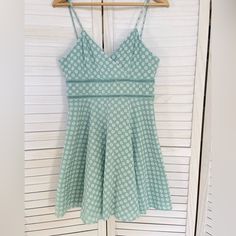 This Beautiful Mint Green Dress From Trixxi Clothing Company Features White Embroidered Flowers And A Flattering Fit & Flare Style. The Dress Is Fully Lined, Has A V-Neckline And Is Sleeveless, And A Short Length Of 30". It Is Made Of 100% Cotton With A Chambray Feel And Embroidered Floral Design. Perfect For Any Occasion, This Dress Is Great For Weddings, Parties, Or Casual Outings. It Is Juniors Size Large And Has A Chest Size Of 32". The Dress Is Easy To Care For And Comfortable To Wear, Spag V-neck Cotton Sundress With Lace Trim, Cotton V-neck Sundress With Lace Trim, Green Lace Mini Dress For Summer, Cotton V-neck Lined Sundress, Summer Lace Fit And Flare Dress, Lace Fit And Flare Summer Dress, Spring Lace Mini Dress With Lining, Spring Lace Mini Dress Lined, Lined Lace Mini Dress For Summer