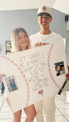 two people holding up a sign that says it would be a perfect night if you did not have to hit home plate coming out of me