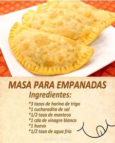 two empanadas sitting on top of a white plate