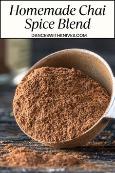 homemade chai spice blend in a wooden spoon with text overlay that reads homemade chai spice blend