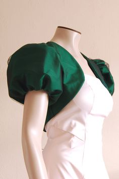 Cropped, fitted Bolero jacket with puff sleeves. Made of plain taffeta, covered with black tulle. Lined. Content: Shell - 100% polyester, Lining - 100% polyester, Gentle hand wash. Drip dry. Do not iron. Green Bolero, Poofy Sleeves, Function Dresses, African Lace Styles, Fashion Design Patterns, Wedding Black, Lace Styles, Womens Jackets, Etsy Wedding