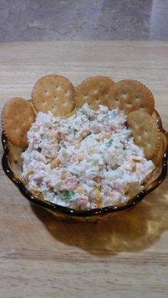 a bowl filled with crackers and cheese