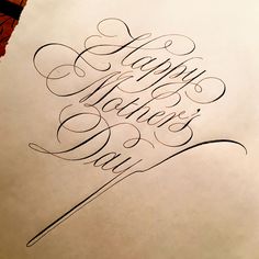 the words happy mother's day written in cursive writing on a piece of paper