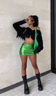 Chrome Mini Skirt Outfit, Green And Black Festival Outfit, Green Mini Skirt Outfit Black Women, Green Outfit Ideas Black Women, Metallic Skirt Outfit Black Women, Metallic Outfit Ideas Concert, Green Outfit Concert, Chrome Outfit Ideas, Metallic Mini Skirt Outfit