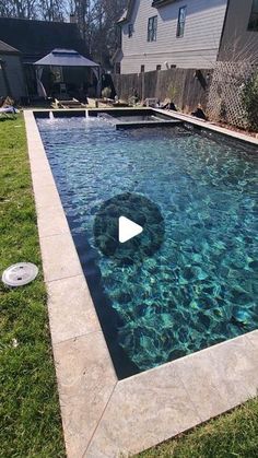 the pool is empty and ready to be used as an in ground water feature for swimming