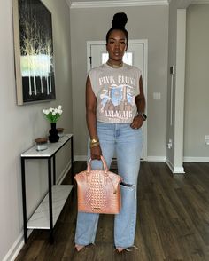 ~Recap of the OOTD~ Always remember, shop your closet first and reimagine pieces you already have. Watch previous reel for step by step details! . . . . ✨What I’m wearing: *Graphic tee: @merchbar (gifted) *Jeans: @zara *Heels: @amazonfashion *Purse: @brahmin *Earrings: @etsy *Necklace and gold bracelets: @imanijewelryco *Apple watch band: Amazon . . . . . . . #theglamcorridor #styleinspiration #styleinspo #fashioninspiration #fashioninspo #fashionblog #styleblog #fashion #style #streetst... Styling Graphic Tees Outfits, Sneakerball Outfits Women, Etsy Necklace, 2025 Style, Saturday Outfit, Jeans Outfit Women, Zara Heels