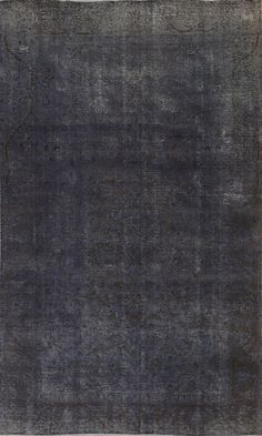 an area rug with dark blue and black colors on it, including the center stripe