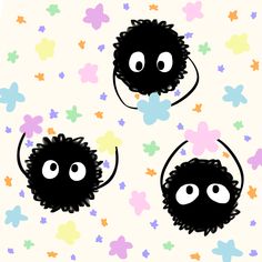 three black monsters with big eyes on a flowery background that looks like they are smiling