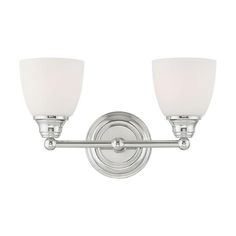 two light bathroom fixture with white glass shades on the top and bottom, in chrome finish