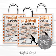 three basketball survival kit bags with an orange and white striped background