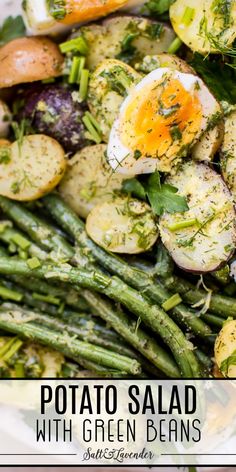 potato salad with green beans and an egg on top