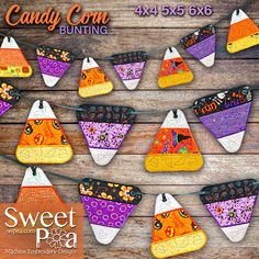 the candy corn bunting is decorated with different colors and designs, including oranges, purples, and browns