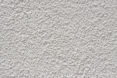 the texture of white paint is shown in this image, it appears to be made from cement