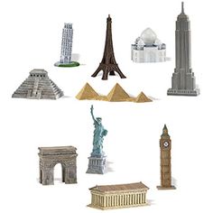 a group of miniature buildings and statues in the shape of an eiffel tower