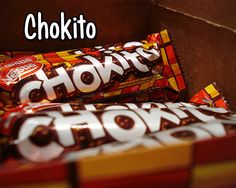 chokto chocolate bars stacked on top of each other in a box with the words chokto above them