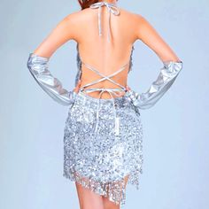 Description:Get ready to show off your dance moves in this glittering party dress. This sequin mini dress is great for petite frames. Crafted with polyester in solid color. embellished with a body-skimming shape covered with sequined tassels throughout. featuring a plunging V neckline along with a halter tie to the neck. a pullover design. and an asymmetrical short hem. Find more unique women's cocktail party dresses or trendy clothing in our boutique. and pair it with strappy heels for a glamor Cocktail Party Dresses, Bodycon Dresses Casual, Bodycon Floral Dress, Trendy Clothing, Sequin Mini, Silver Dress, Pullover Designs, Crop Top Blouse, Sequin Mini Dress