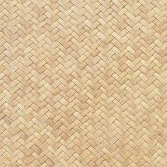 a close up view of the texture of a woven bamboo mat, which is light brown