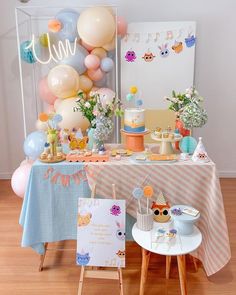 a birthday party with balloons and decorations