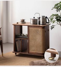 a wooden cabinet with tea kettles on it and a potted plant next to it