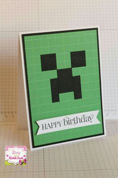 a birthday card made with the shape of a minecraft creeper face on it