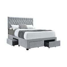 an upholstered bed with drawers underneath it