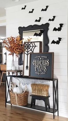 a halloween entryway with bats on the wall