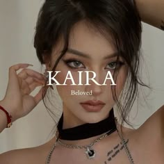 a woman wearing a choker with the words karra below her chest