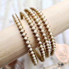 You’ll love wearing these pearl embellished bangles on their own or mixed into your favourite set. With a deep gold 22k base and subtle pearl stones, these are a versatile addition to your collection. *Sold as a pair (2 bangles) Bridal Bangle Set, Pearl Bangle, Bridal Bangles, Bangle Set, Bangles Jewelry, Gold Set, Gold Bangles, Deep Red, Timeless Beauty