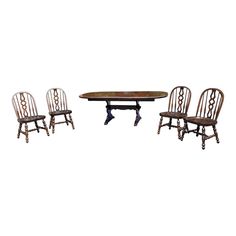 four chairs and a table are shown against a white background