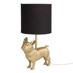 a gold dog lamp with a black shade