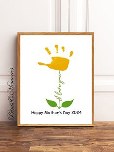 a poster with the words happy mother's day on it and a hand print