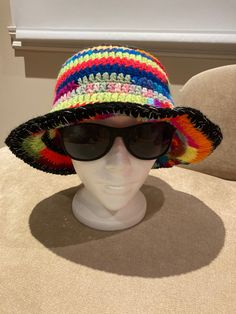 "hand crocheted bucket hat with silver thread brim Size: S-L Crown: 6.5\" Height: 9.5\" Width:12\" Head curcumference: 21-24\" Great hand crocheted bucket hat with silver thread brim" Casual Crochet Sun Hat With Flat Brim, Adjustable Crochet Hat With Flat Brim, Brimmed Yarn Bucket Hat, Cotton Yarn Crochet Hat With Curved Brim, Crochet Straw-like Hat With Curved Brim, Crochet Straw Hat With Curved Brim, Crochet Yarn Straw Hat With Curved Brim, Crochet Cotton Yarn Brimmed Sun Hat, Crochet Cotton Brimmed Sun Hat