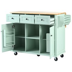 a white kitchen island with drawers on wheels