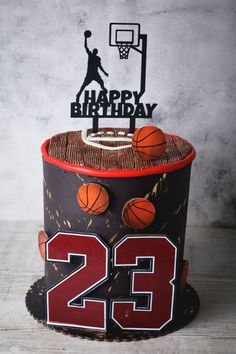 a birthday cake made to look like a basketball jersey with the number 23 on it