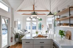 the kitchen is clean and ready to be used as a living room or dining area