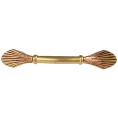 a gold colored metal handle on a white background