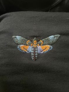 My deaths head hawk moth drawing, digitized and embroidered by Prinftul on comfort colors t shirts, their info below! - - If you're looking for a thick, structured tee that's also super soft and breathable--look no further! The men's garment-dyed heavyweight t-shirt ticks all the boxes and is made of 100% ring-spun cotton. The regular t-shirt style will complement most looks and fit you to a tee. * 100% ring-spun cotton * Fabric weight: 6.1 oz/yd² (206.8 g/m²) * Garment-dyed * Relaxed fit * 7/8″ double-needle topstitched collar * Twill-taped neck and shoulders for extra durability * Double-needle armhole, sleeve, and bottom hems * Blank product sourced from Honduras This product is made especially for you as soon as you place an order, which is why it takes us a bit longer to deliver it to Deaths Head Moth Illustration, Moth Sweater, Deaths Head, Moth Drawing, Moth Sweatshirt, Deaths Head Moth, Moth T Shirt, Hawk Moth, Embroidered Tee