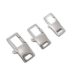 three metal buckles are shown on a white background and one has a hole for the clasp