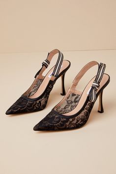 Strut like you mean it in the Steve Madden Bri Black Lace Ribbon Pointed-Toe Slingback Pumps! Sheer floral lace and smooth faux leather come together to shape these flirty pumps with a pointed-toe upper, a low-cut collar, and a single sole silhouette. A grosgrain ribbon creates a cute bow accent at the outstep as it adorns the slingback strap (with a bit of elastic at the side for fit). A sophisticated sculpted stiletto heel lends a sultry finish! 4" wrapped sculpted heel. Cushioned insole. Felt Spring Lace Heels With Pointed Toe, Elegant Heels With Lace Trim And Fitted Design, Elegant Heels With Lace Trim, Elegant Fitted Heels With Lace Trim, Lace Heels With Lace Trim For Party, Elegant Lace-up Heels In Lace Material, Elegant Lace Trim Heels For Formal Occasions, Elegant Low Heel Lace-up Heels, Spring High Heel With Lace Trim