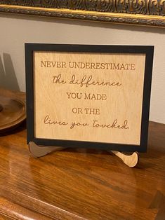 a wooden sign that says never underestimate the affection you made or the love you taught