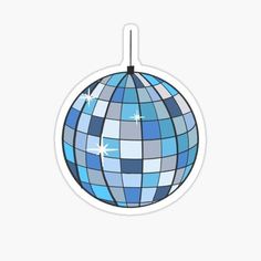 an ornament with blue and grey squares on it's surface sticker