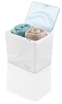 a white box with two towels and a blue towel in it on a white background