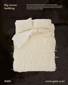 an advertisement for a bed with white sheets and ruffles on the bottom side