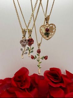 DESCRIPTION:  This beautiful gold long-stemmed rose necklace is the perfect accessory to add elegance and sophistication to any outfit. The necklace features a delicate chain that complements the intricately designed rose pendant. Available in both red and pink, this necklace is a perfect gift for a loved one or a well-deserved treat for yourself. Crafted with high-quality materials, this necklace is not only beautiful but also durable, ensuring that it will remain a treasured piece for years to Red Rose Necklace, Red Cross Necklace, Xoxo Jewelry, M Necklace, Rose Clothing, Rose Stem, Beads Bracelet Design, Gold Cross Pendant, Necklace Red