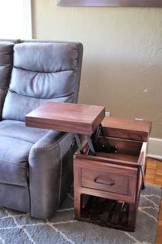 a recliner chair and end table in a living room