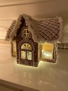 a gingerbread house made to look like it has been decorated