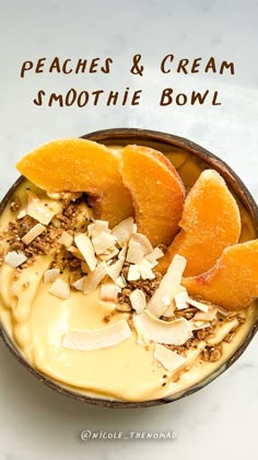 a bowl filled with orange slices and cream